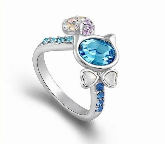 The cute blue topaz cat shaped ring