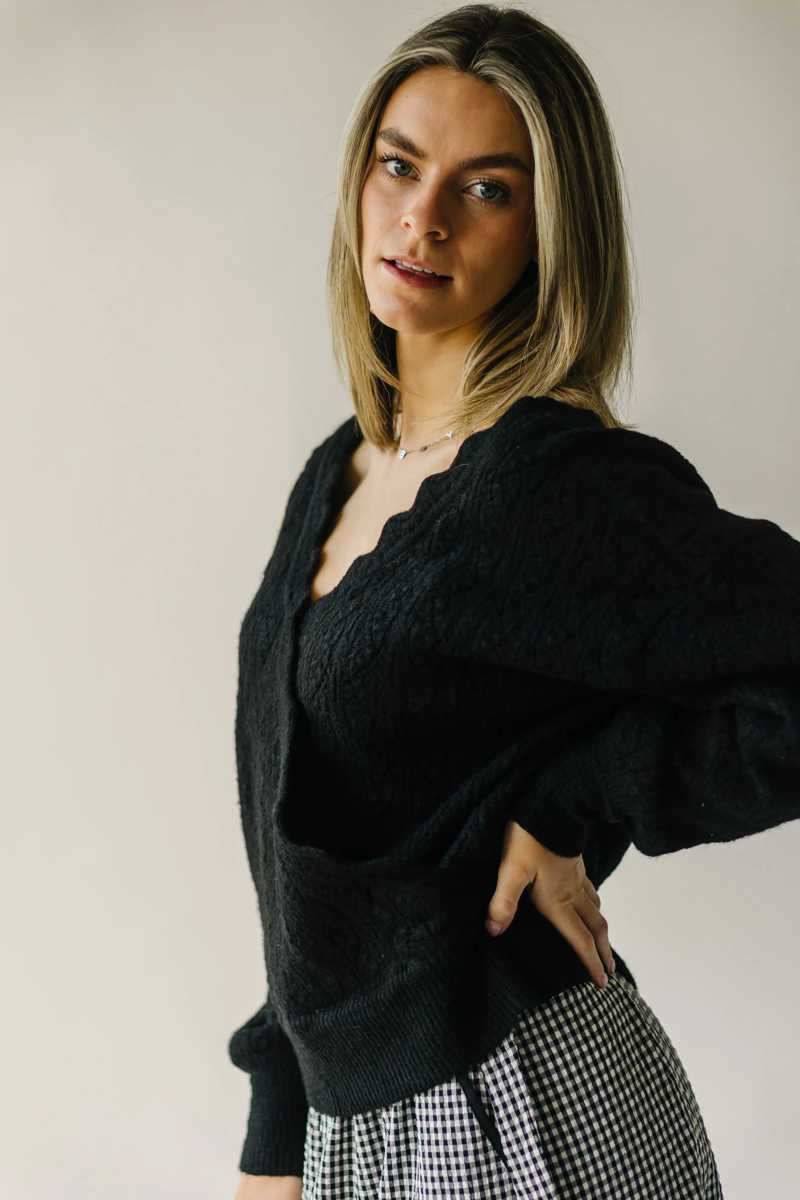 The Tagger Knit Wrap Sweater in Black